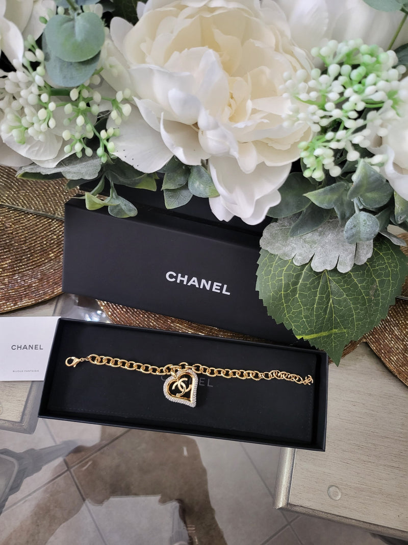 Chanel CC heart charm bracelet in its box with card