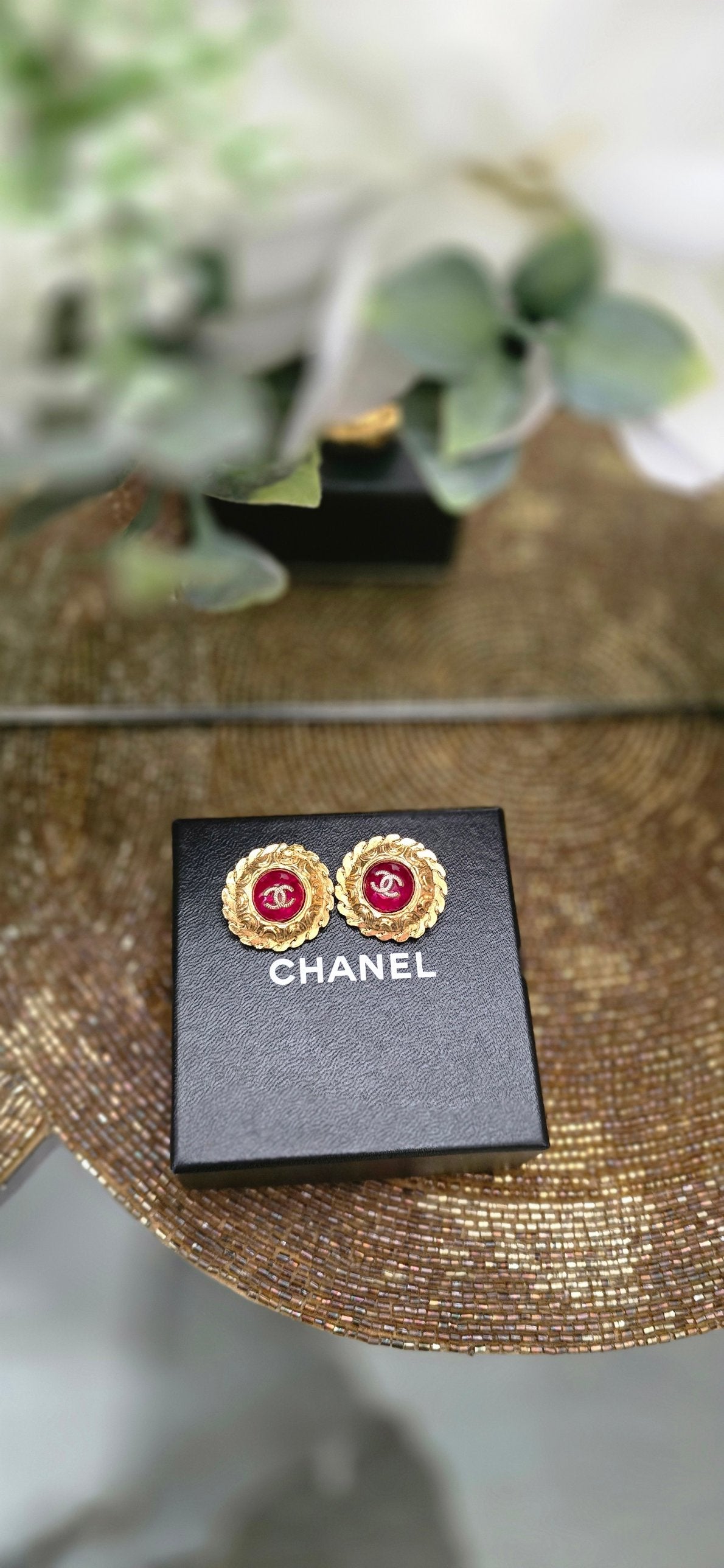 Vintage Chanel round CC earrings with red cabochons