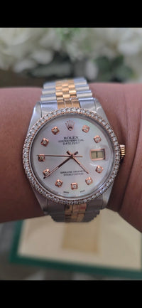 Rolex Datejust steel and rose gold with diamond bezel and mother-of-pearl dial
